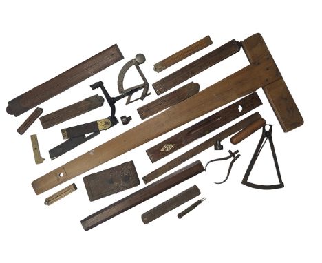 Collection of Vintage Wooden Rulers and drawing tools.