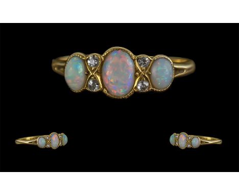 Antique Period Attractive 18ct Gold Opal and Diamond Set Ring with excellent setting, fully hallmarked; the well matched opal