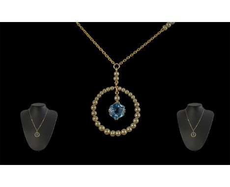 Ladies 9ct Gold Pleasing and Exquisite Aquamarine and Seed Pearl Set Pendant with attached 9ct gold chain, set with pearls, m