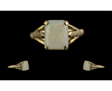 9ct Gold Attractive Rectangular Shaped Single Stone Opal Set Dress Ring. The Opal of Good Colour - Oranges / Greens, Est 2.00