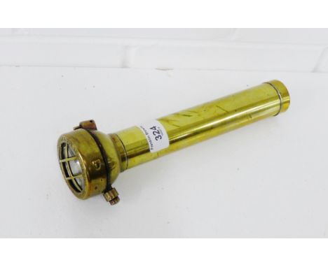 A vintage brass Oldham & Son Ltd, Denton of Manchester type TDi flashlight, 25cm long