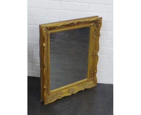 A gilt framed rectangular wall mirror 