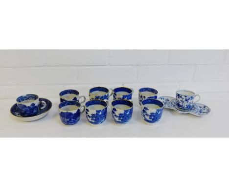 A collection of 19th century and later blue and white cups and saucers to include 'Willow' and 'Pagoda' patterns, together wi