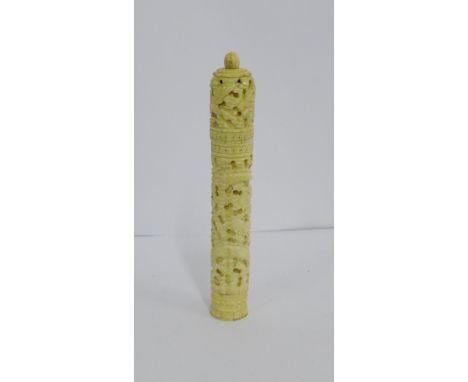 A carved bone container with lotus flower finial to the lid, 16cm long  