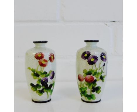 A pair of miniature Ginbari enamel vases with mixed flower pattern to a white ground, 9cm high, (2) 