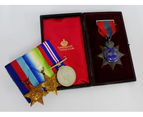 WWII medals to include the 1939 - 1945 Star, Atlantic Star and War medal together with an Edward VII Imperial Service  Order 