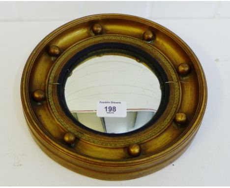 A miniature circular convex mirror, 25cm diameter