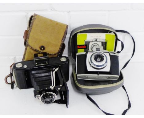Two vintage cameras to include a Zeiss Ikon and a Kodak 44B, (2) 