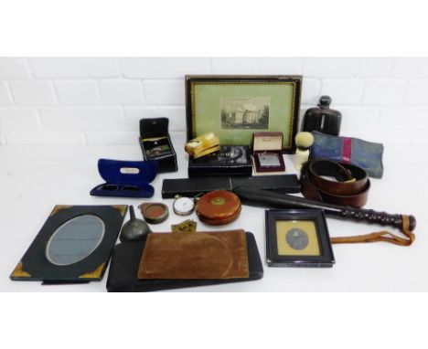 A carton of miscellaneous items to include a truncheon, a pewter mounted hip flask, spectacles, Ronson lighter, bridge cards 