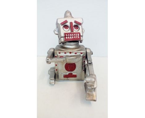 Cast iron mechanical moneyb box in the form of a robot, height 18cm 