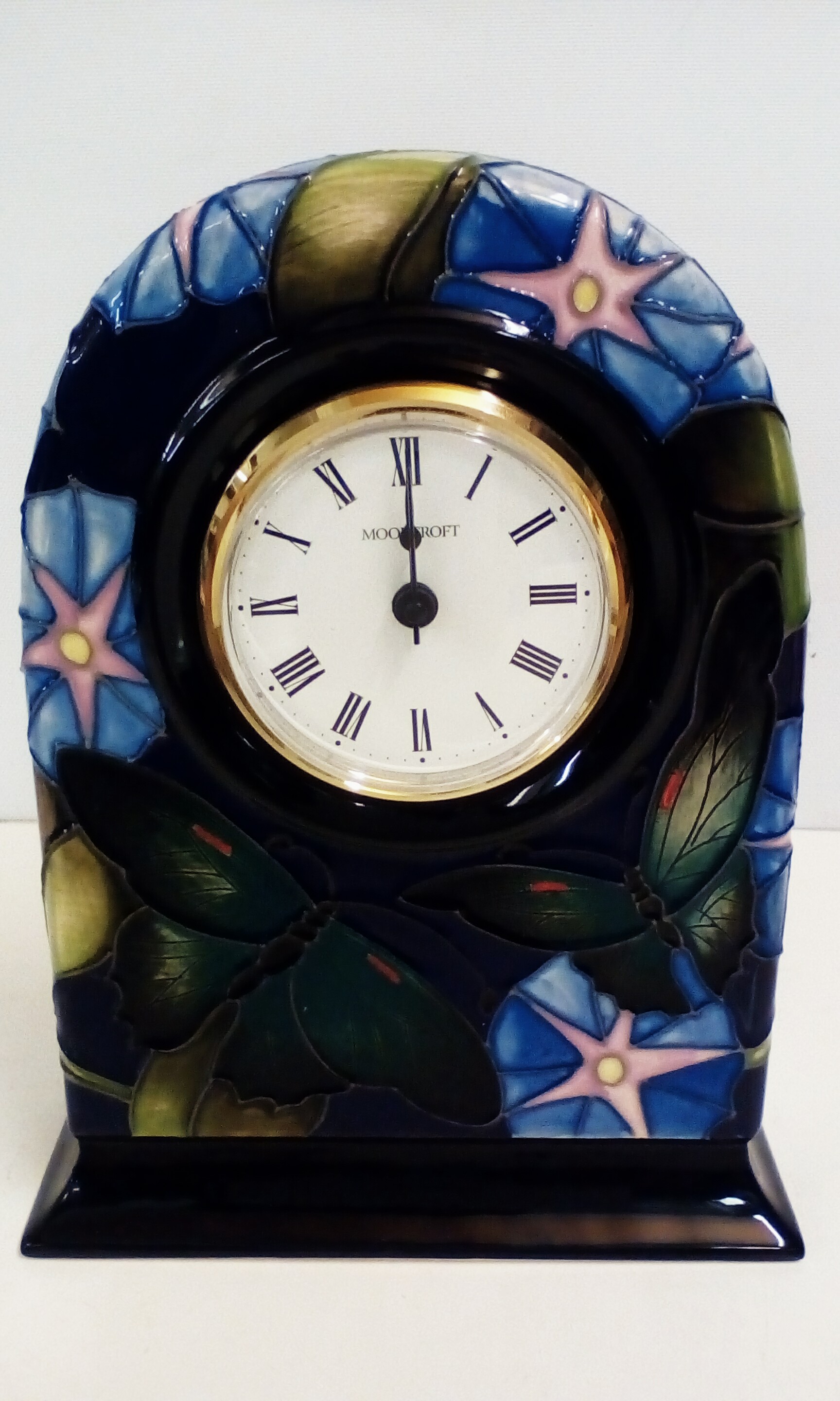 Moorcroft clock in the Bellbind pattern, height 19cm