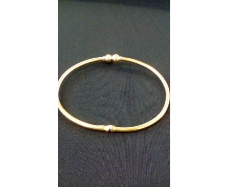 9 ct gold bangle, 5 grams 