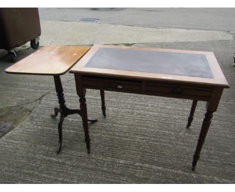 A Victorian mahogany two drawer writing table with inset leather top, on turned supports, together with a further snaptop tab