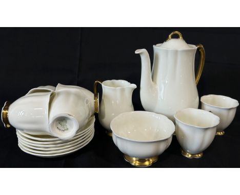 A collection of mixed china to include a white ground and gilt Royal Doulton coffee set, Wedgwood black ground tea pot and su