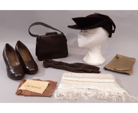 A collection of 1940's ladies accessories in brown, some with wartime utility marks, including leather shoes size 5/6 by Pand