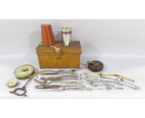 A small tub of silver handled flatware, mustard spoons etc, a tin strong box, two vintage tape measures and four pocket stirr