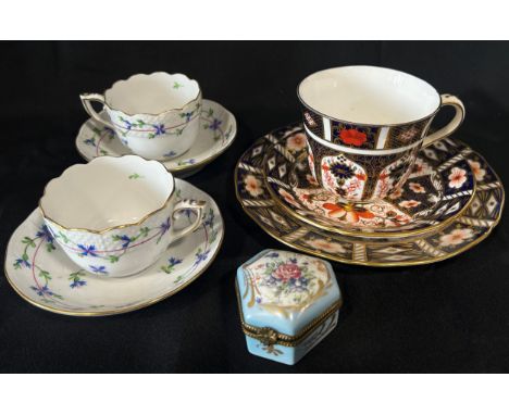 A pair of Doulton Lambeth vases, a Crown Derby Imari pattern trio, A pair of Herend cups and saucers, 3 Royal Doulton figures