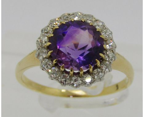 Mid-20th century yellow metal amethyst and diamond halo cluster ring, ring head 1.3cm diameter approx., size S/T, 5.4g 