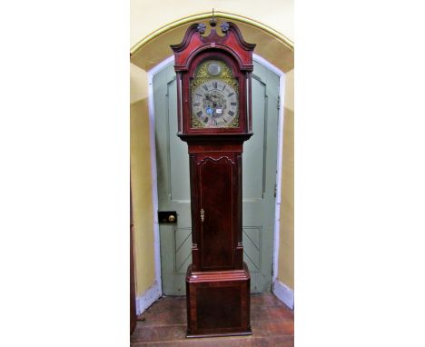 A Georgian mahogany longcase clock, the trunk with reeded column supports, the hood with swan neck pediment, with string band