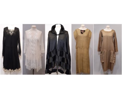 A collection of five 1920's ladies' garments comprising a black dress of chiffon and silk with contrasting decorative lace to