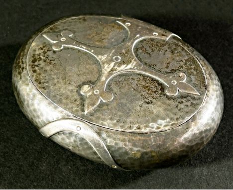 A lightly hammered Arts &amp; Crafts silver gilt lined oval tobacco box bearing an inscription referring to the local Wotton-