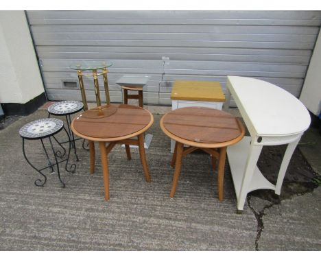 A collection of contemporary furniture including a pair of circular Ercol light elm occasional tables on four swept supports,