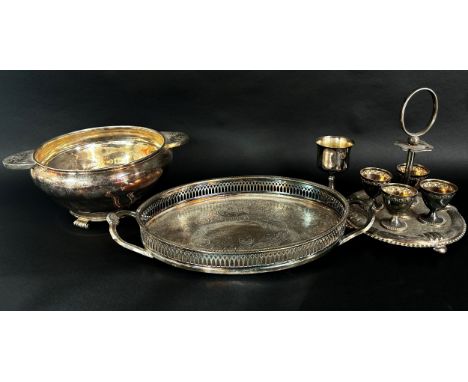 A Georgian style silver plated scalloped edged salver, an egg cruet, a fruit bowl, two punch ladle, a circular tray with a fi