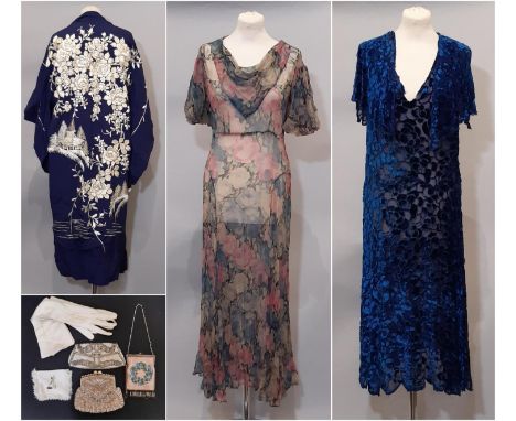 Two vintage dresses circa 1920's comprising a dress in fine printed silk with puffed sleeves and cowl neckline, and a dress o