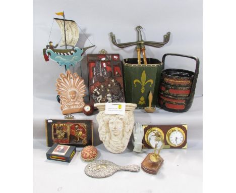 A miscellaneous collection of items including a rocking fishing boat, an Empire style wall bracket, a Southeast Asian rice st