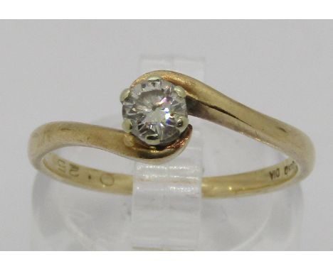 9ct diamond solitaire crossover ring, 0.20ct approx, 2g 