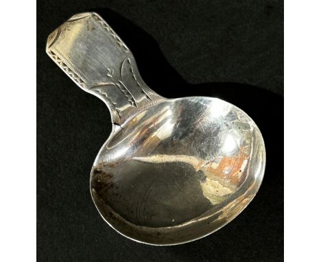 A George III silver caddy spoon, London 1802, maker John Pritchard, 6 cm long 