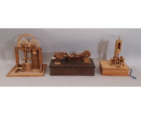 Three scratch-built wooden stationary steam engines models including a vertical engine with flywheel and cogs in working orde