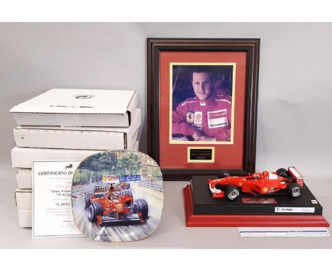 Formula 1 interest: Michael Schumacher signed  2000 model car 1:18 scale  on plinth with purchase receipt from Grand Prix Leg