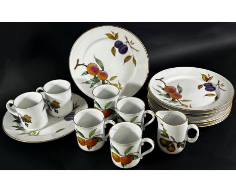 A large mixed group of Royal Worcester Evesham dinner wares to include dinner plates, mugs, milk jug, etc 