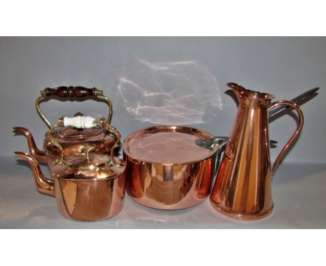 A highly polished collection of 19th century copper ware including three pitchers, two bed warmers, a saucepan with lid, two 