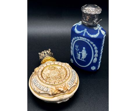 A Victorian commemorative scent bottle, the circular ceramic body by Royal Worcester depicting a young Victoria and 'India Ca