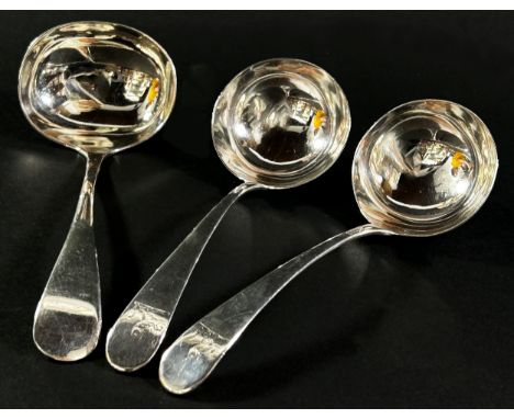A pair of Georgian silver sauce ladles, both engraved with a lion rampant, hallmarks rubbed, 15 cm long approximately, togeth
