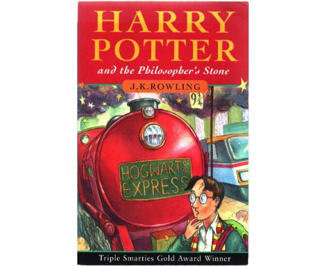J K Rowling Harry Potter and the Philosopher's Stone paper back book unsigned. Good condition.