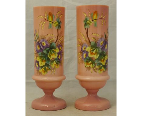 A pair of 19th century enamel painted pink glass vases