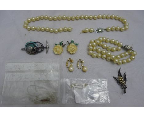 An Oberammergau souvenir brooch, simulated pearl necklaces, seed pearls, etc.