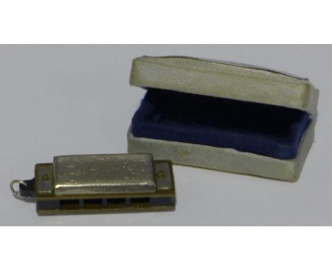 A miniature harmonica