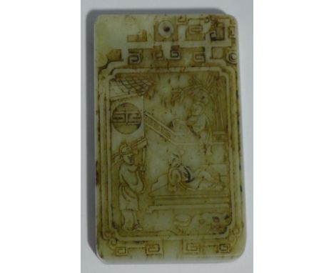 A jade pendant decorated with calligraphy and figures