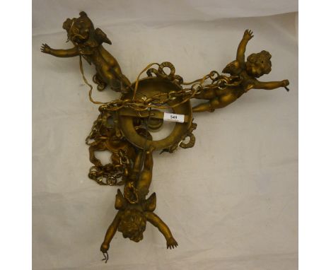 A gilt hanging light formed as cherubs