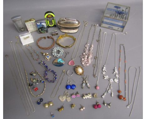 Costume jewellery includes necklaces, bracelets earrings (some silver) also Ronson table lighter, miniature lighter, jukebox 