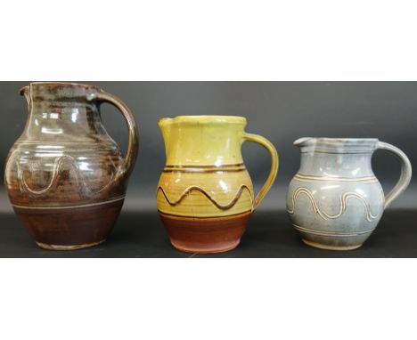 3 Winchcombe Pottery stoneware Studio Pottery jugs, 20.5cm, 16.5cm, 13.5cm high (smallest jug has a crack from the rim)