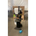 Automatic grommet machine