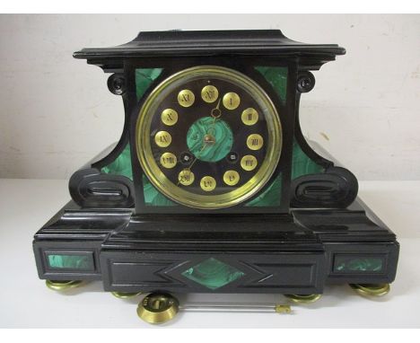A late Victorian black marble and malachite cased mantle clock on button feet, with an Arabic dial, the movement marked Dupla
