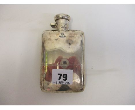 An Edwardian silver hip flask, Birmingham 1918 with detachable silver gilt cup, 175 grams, 5 high, A/F