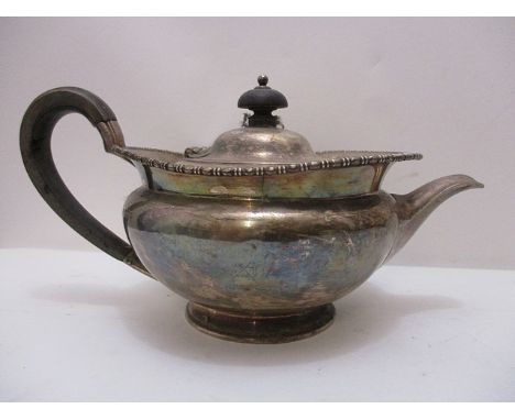A silver teapot having beaded decoration by Akin Brothers, Sheffield 1908, total weight 522 grams