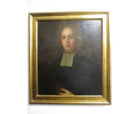 18th Century British School - a head and shoulders portrait of a gentleman wearing a wig, a white collar and black jacket, ho